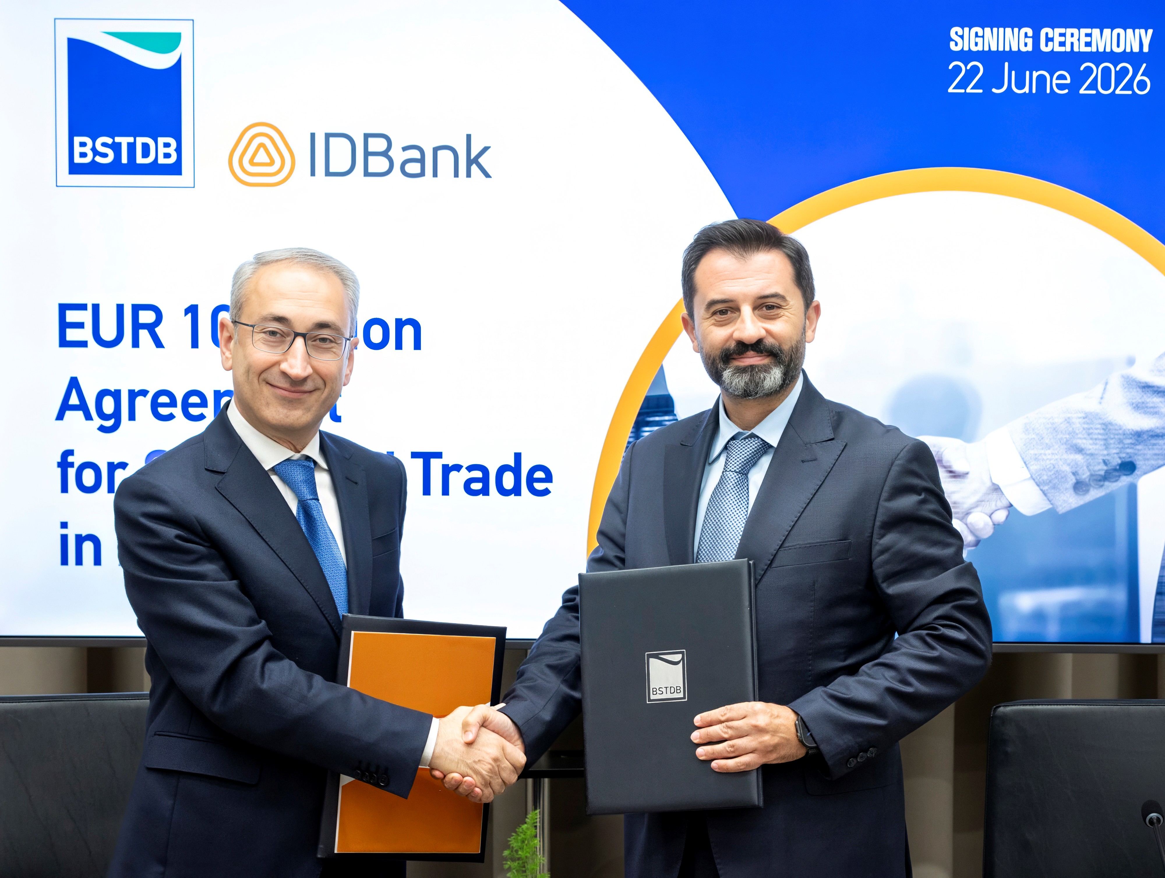 BSTDB President Serhat Köksal and IDBank Chairman Mher Abrahamyan shake hands following the signing of a EUR 10 million agreement to support SMEs and trade in Armenia